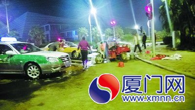 出租車是“幽靈”洗車攤的最主要“客戶”。